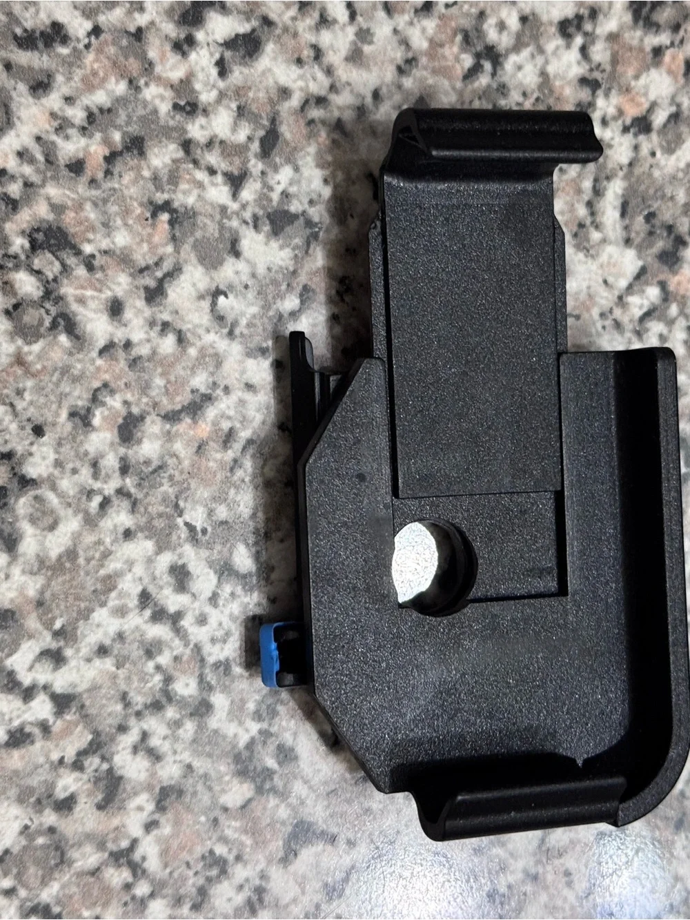 Universal Black Phone Holster with Blue Release Button for iPhone 14